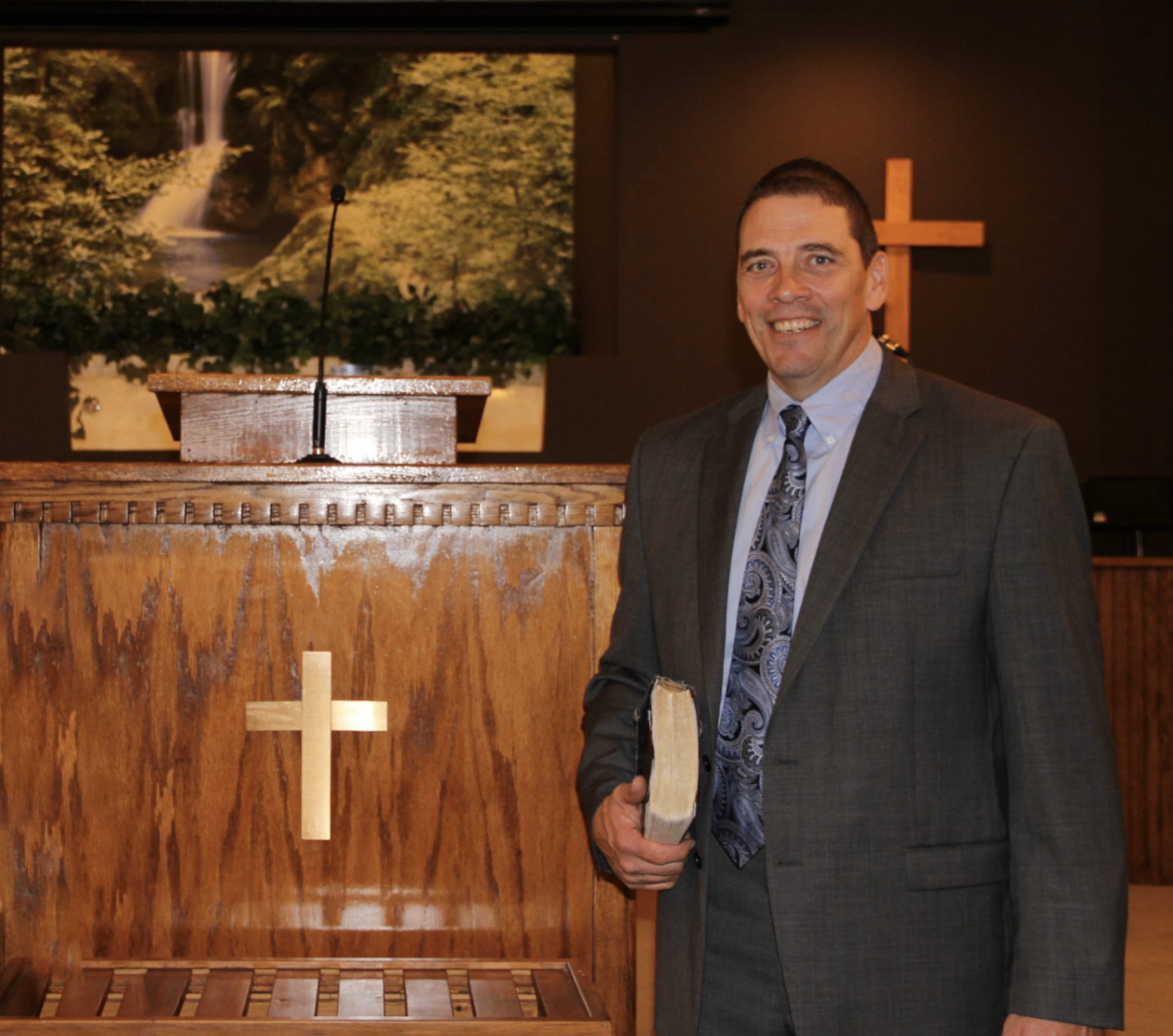 Pastor John at the pulpit